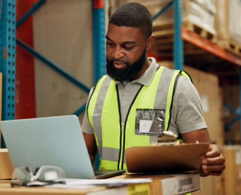 Person Using Computer Warehouse
